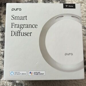 Pura smart fragrance diffuser used in box